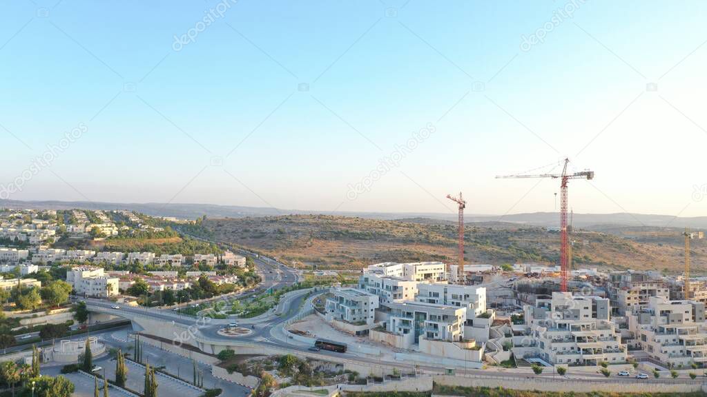Cranes at construction site oin Israel City modiinModiin city, israel, july,2020