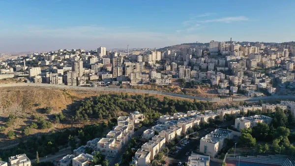 Israel and Palestine town divided by wall, aerialpisgat zeev and anata refugees camp, Jerusalm israel