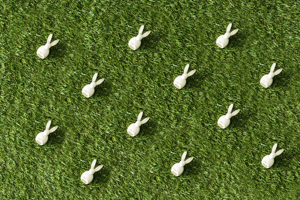 Top View Decorative White Bunnies Green Grass Surface — Stock Photo, Image