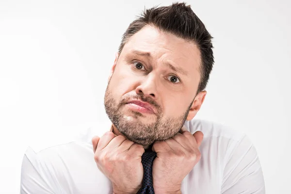 Chubby Man White Shirt Looking Camera Adjusting Tight Tie Isolated — Stock Photo, Image