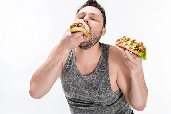 Nadváha Muž Cisterně Konzumní Chutný Hot Dog Izolovaný Bílém — Stock fotografie