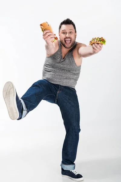 Excited Overweight Man Holding Hot Dogs Looking Camera White — Stock Photo, Image