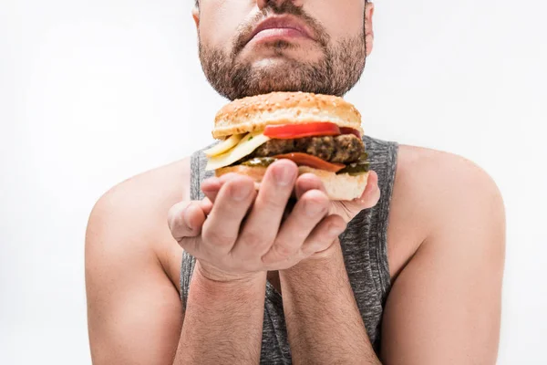 Beyaz Izole Lezzetli Burger Tutan Kilolu Adam Kırpılmış Görünümü — Stok fotoğraf