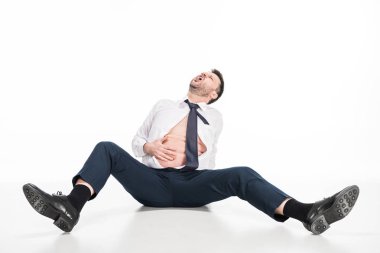 beyaz otururken dar resmi giyim karın dokunmadan kızgın kilolu adam