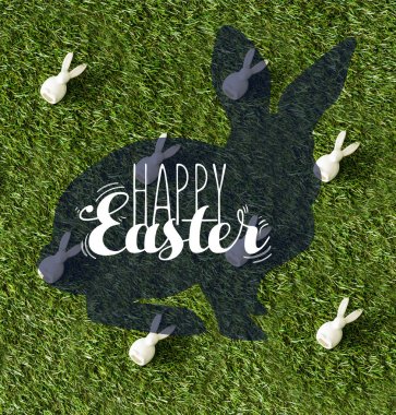 mutlu Paskalya yazı ile yeşil çim dekoratif bunnies üst görünümü 