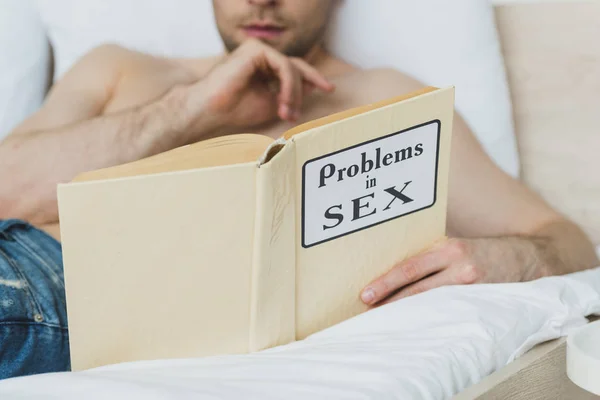 Partial View Shirtless Man Lying White Bedding Reading Problems Sex — Stock Photo, Image