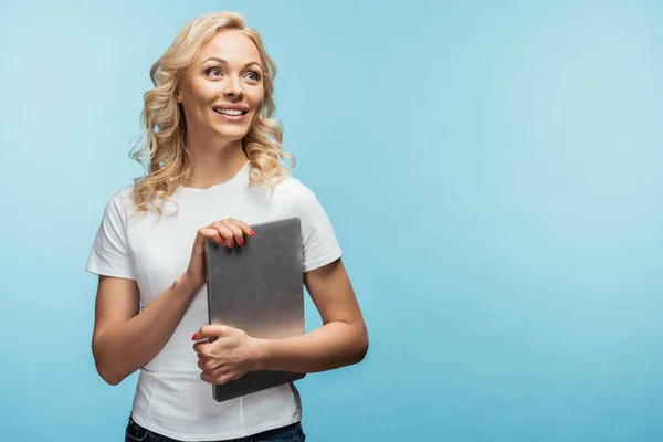 Happy Blonde Woman Holding Laptop Standing Blue — Stock Photo, Image