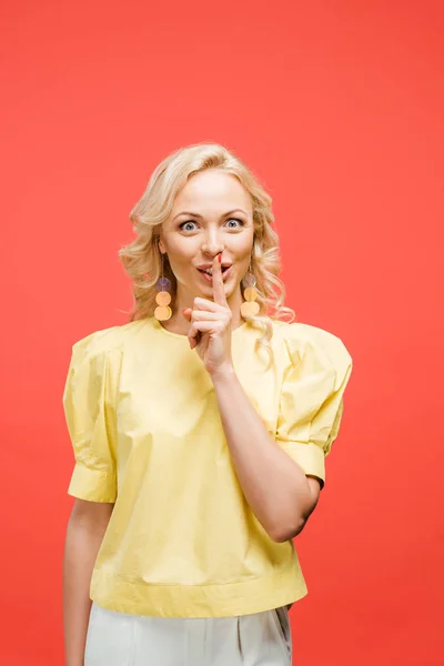 Cheerful Blonde Woman Looking Camera Showing Hush Sign Red — Stock Photo, Image