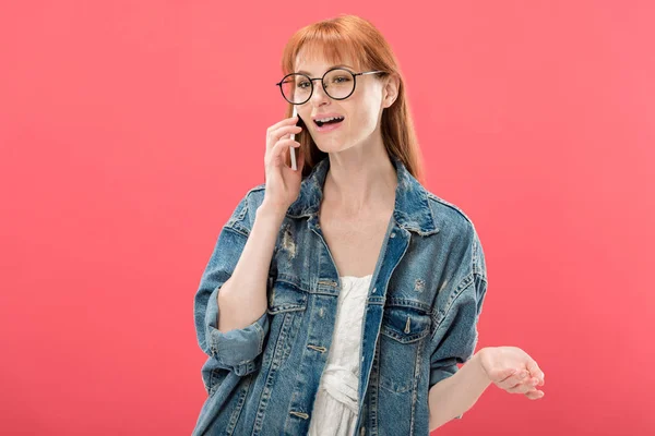 Attractive Redhead Girl Glasses Denim Jacket Talking Smartphone Isolated Pink — Stock Photo, Image
