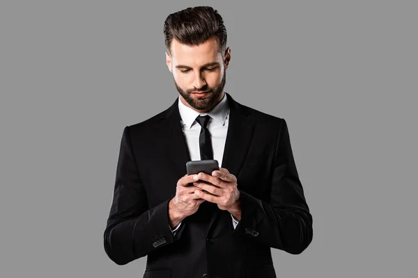 Bearded Businessman Black Suit Using Smartphone Isolated Grey — Stock Photo, Image