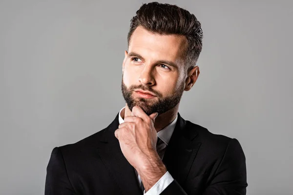 Pensive Handsome Businessman Black Suit Looking Away Isolated Grey — Stock Photo, Image