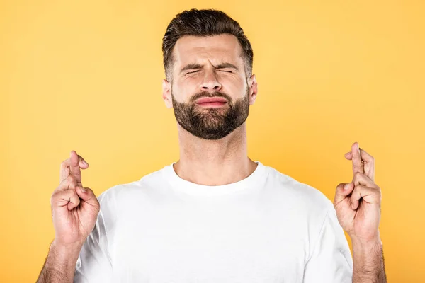 Handsome Man White Shirt Crossed Fingers Isolated Yellow — Stock Photo, Image
