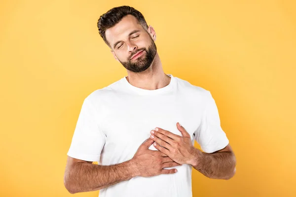 Pleased Handsome Man White Shirt Touching Heart Isolated Yellow — Stock Photo, Image