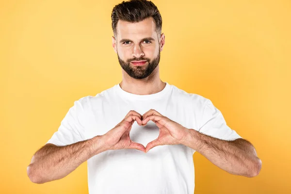 Handsome Man White Shirt Showing Heart Sign Hands Isolated Yellow — Stock Photo, Image