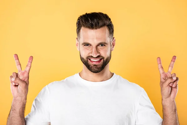 Smiling Handsome Man White Shirt Looking Camera Showing Peace Signs — Stock Photo, Image