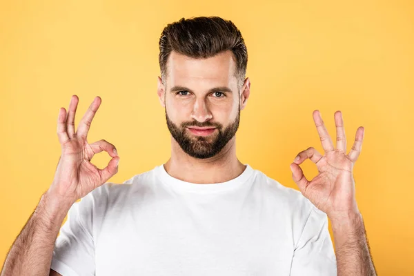 Handsome Man White Shirt Showing Okay Signs Isolated Yellow — Stock Photo, Image