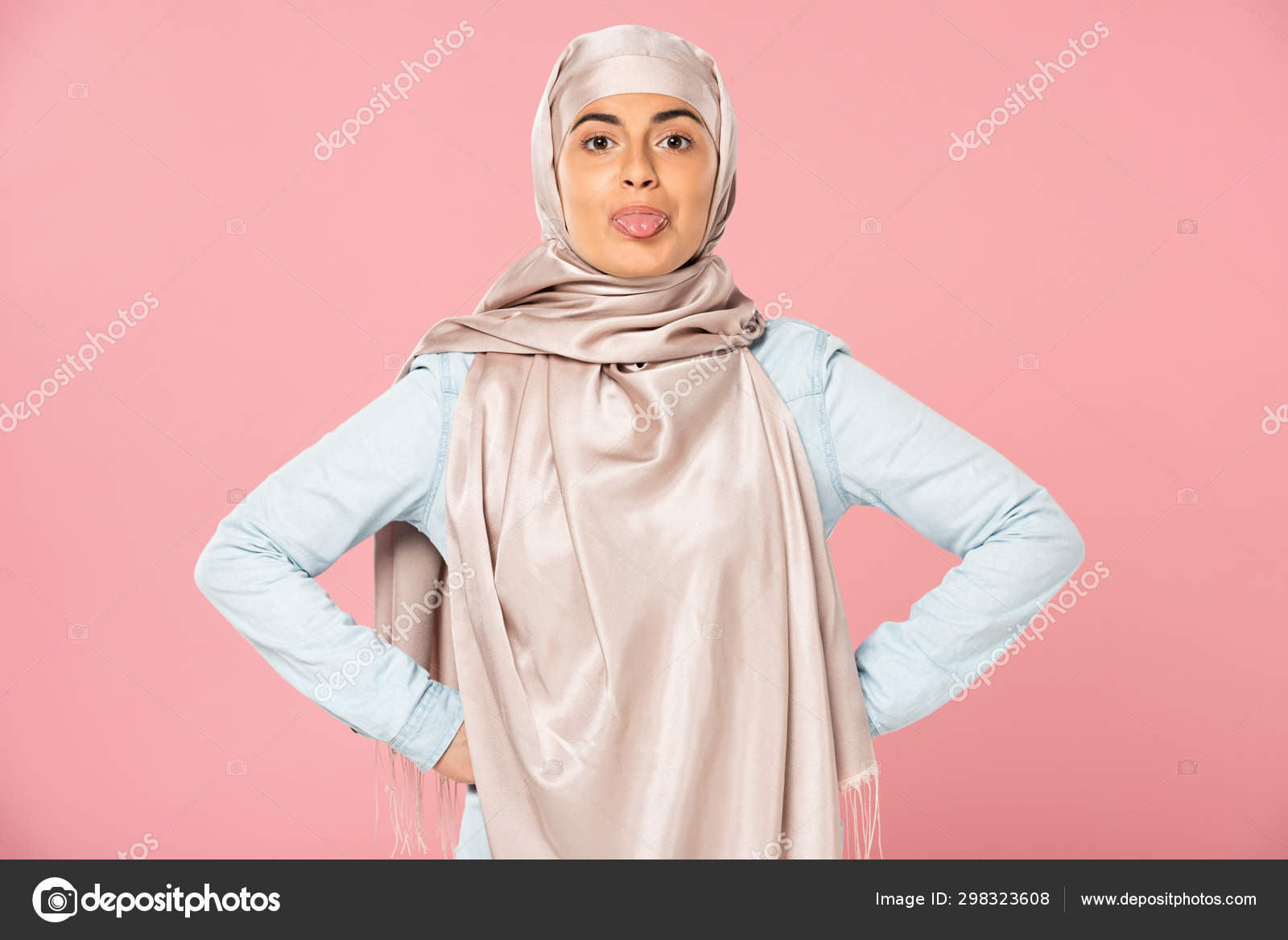 Beautiful Funny Muslim Woman Hijab Sticking Tongue Out Isolated Pink Stock  Photo by ©DmitriyAnaniev 298323608