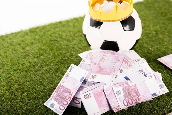 Billetes Euros Cerca Pelota Fútbol Con Corona Papel Sobre Hierba —  Fotos de Stock