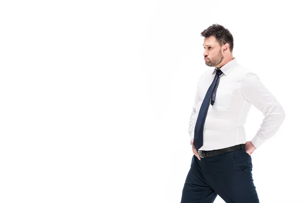 Overweight man in tight formal wear posing isolated on white with copy space — Stock Photo