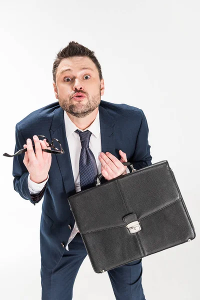 Chubby businessman in formal wear gesturing and looking at camera isolated on white — Stock Photo