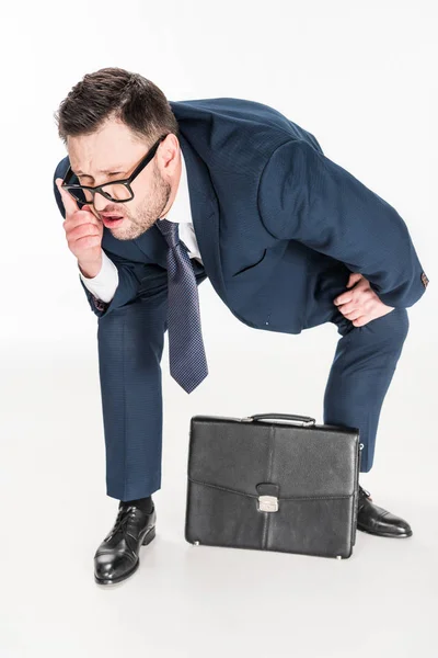 Chubby businessman in formal wear with briefcase isolated on white — Stock Photo