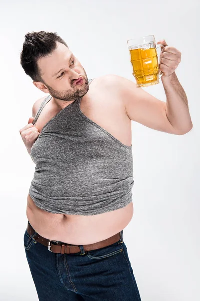 Overweight man pouting lips and holding glass of beer isolated on white — Stock Photo