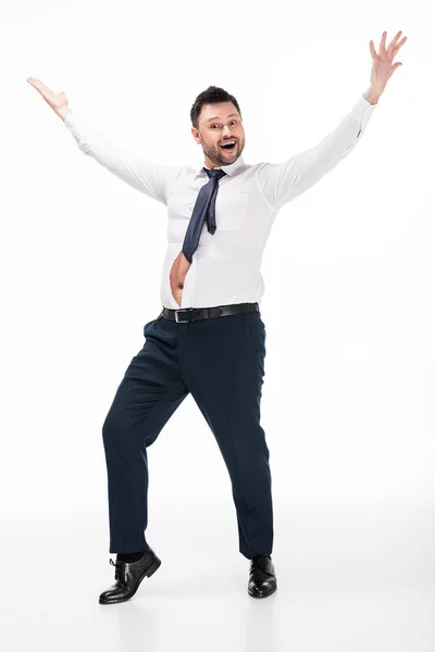 Glücklicher übergewichtiger Mann in enger formaler Kleidung mit ausgestreckten Händen auf weißem Grund — Stockfoto