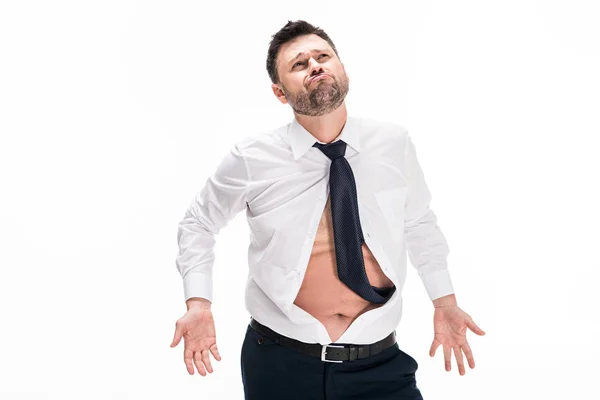 Confused overweight man in tight formal wear gesturing with hands isolated on white — Stock Photo