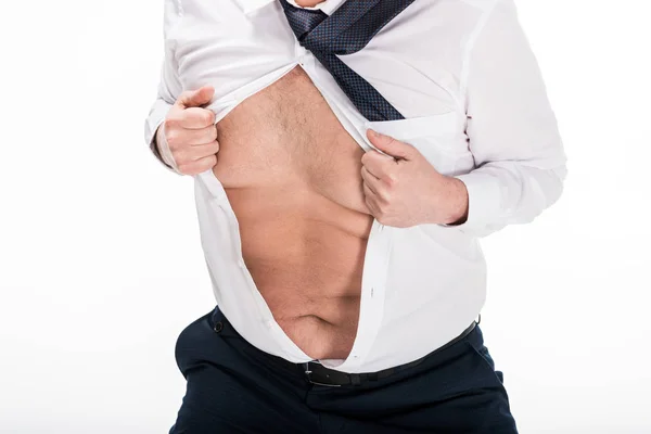 Vista ritagliata di sovrappeso uomo in stretto abbigliamento formale mostrando pancia isolata su bianco — Foto stock