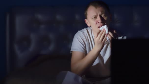 Upset Man Wipes Away Tears Napkin While Sitting Night Front — Stock Video