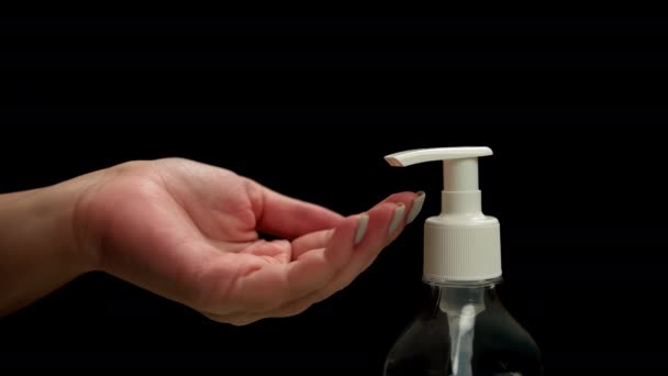 Female Hands Press Antiseptic Dispenser Squeeze Out Gel Close Dark — Stock Video