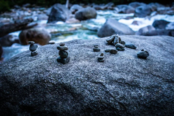 Little rock formations found on large rock in creek