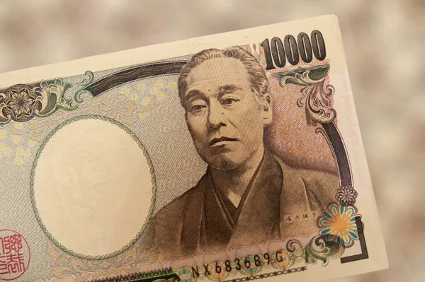 日本のお金 000円の銀行券のクローズアップ 正面図 ぼやけた背景に隔離されました 水平射撃 — ストック写真