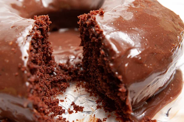 Traditional Brazilian cake - Chocolate cake with brigadeiro sauce. Side view. Close-up.