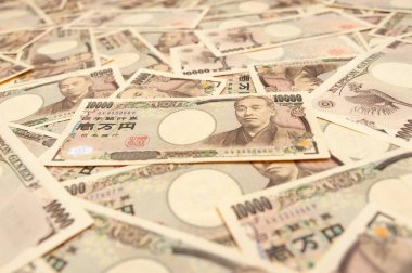 10,000 Yen Note - On bin yen (ön) 'lik banknotların bakış açısına sahip arka plan. Japon parası. Maddi bolluk kavramı. Yatay çekim.