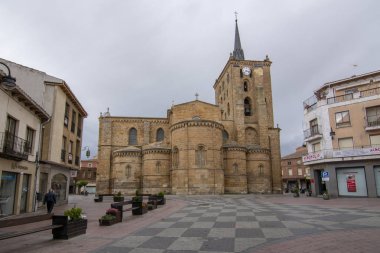 Benavente, Zamora,  Spain, June 2017: Romanesque facade with five semicircular apses and tower, show some of different architectural styles found in Church of Santa Maria del Azogue of Benavente, clipart