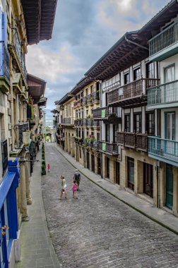 Hondarribia, Guipuzcoa, Spain, August 2013: Old houses in the center of Hondarribia, a town in Gipuzkoa, Basque Country, Spain, near the French border clipart
