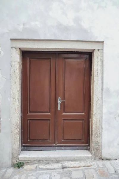 Unique wooden doors in Mediterranean old town.