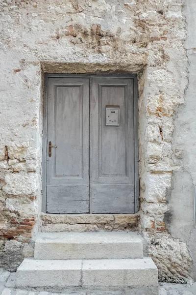 Unique wooden doors in Mediterranean old town.