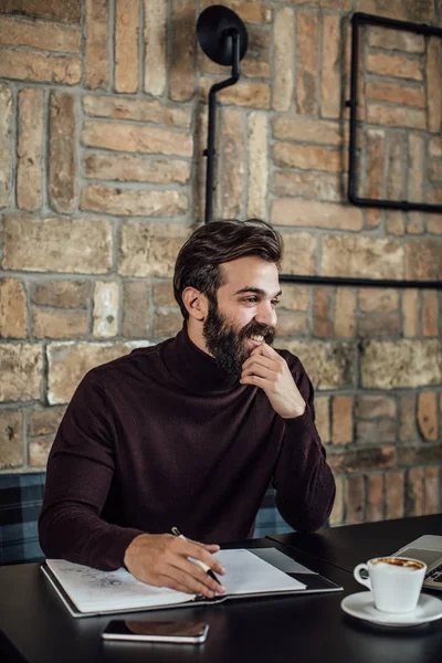 Young Cheerful Caucasian Man Freelancer Writing Notebook Coffee Shop — Stock Photo, Image