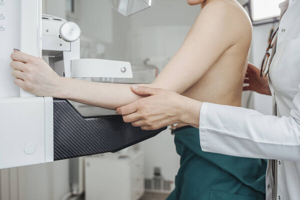 A woman having mammography examination at hospital.