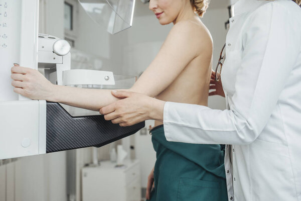 A woman having mammography examination at hospital.