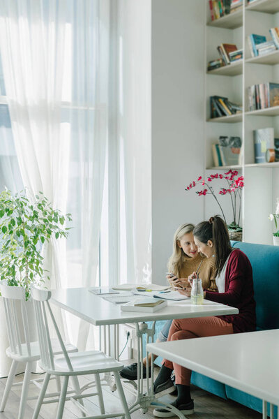 Two Friends Studying Together