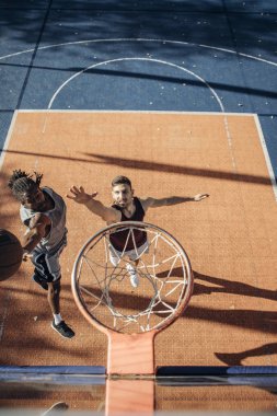 Two Basketball Players in a Duel