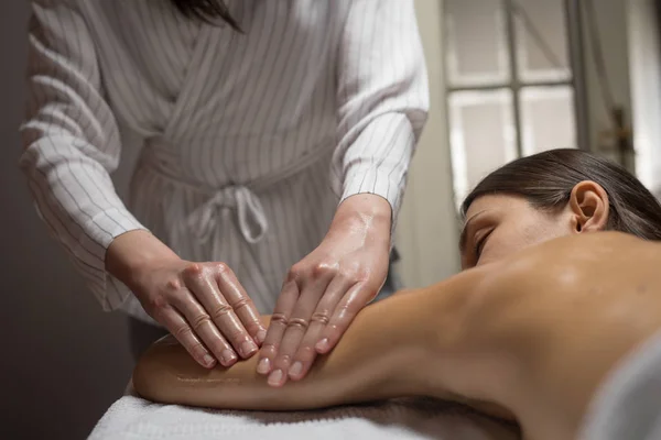 Woman Enjoying Arms and Shoulders Massag