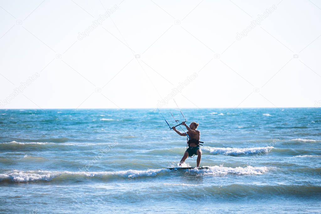 Professional Kite-Surfer Surfing on the Sea