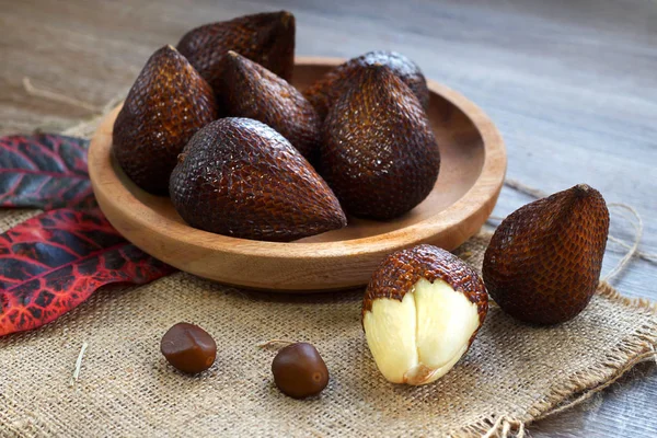 Salak fruit or snake fruit native to Java island on bamboo basket