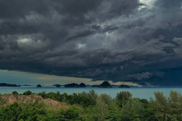 Dramatic stormy cloud sky above Krabi Thailand islands in turquoise sea. Storm in Thailand. Tropical Storm Pabuk.