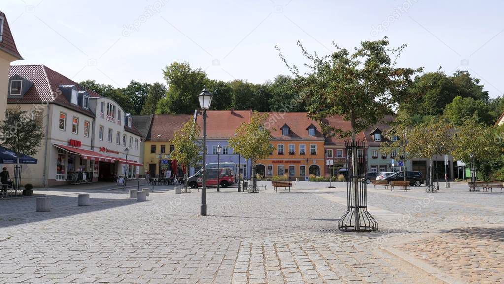 BAD MUSKAU, GERMANY - SEPTEMBER 2018: The main market square in a city center of Bad Muskau town, Germany. Bad Muskau is a spa town in upper Lusatia, Saxony at the border with Poland.
