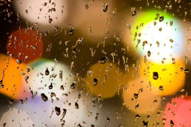 ufuk bokeh ışıklar cam ve damla su geçmiş